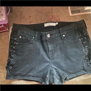 Black denim shorts with lace up detail